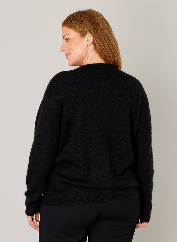 Zwart vest met parelmoer knopen