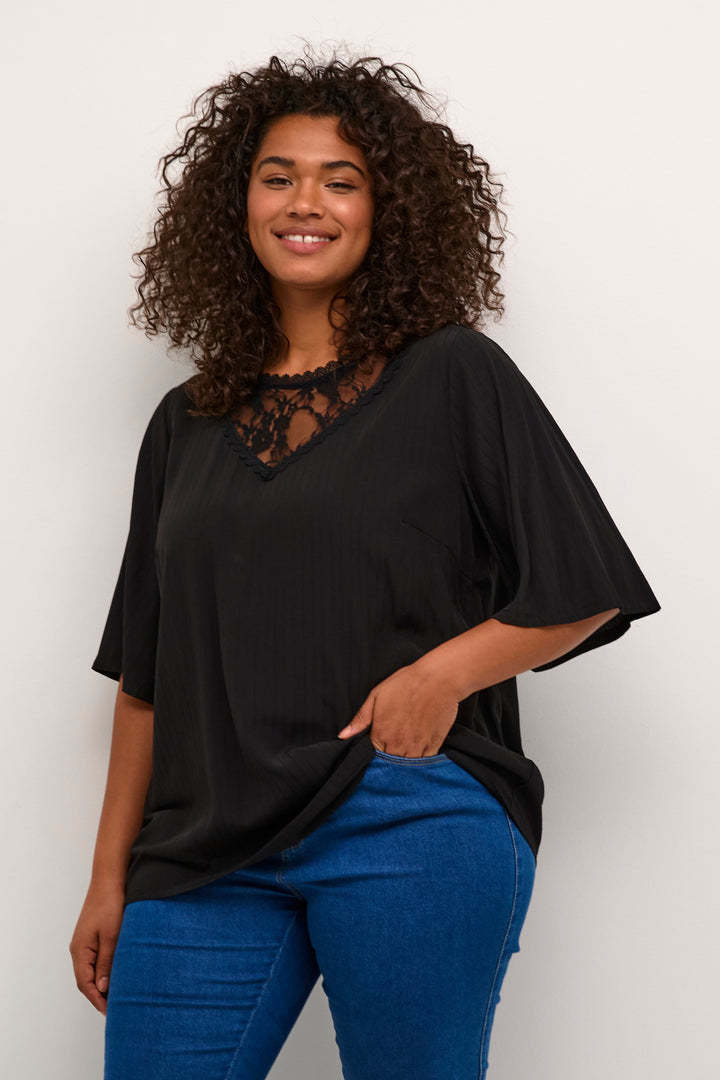 elegante blouse met kanten details