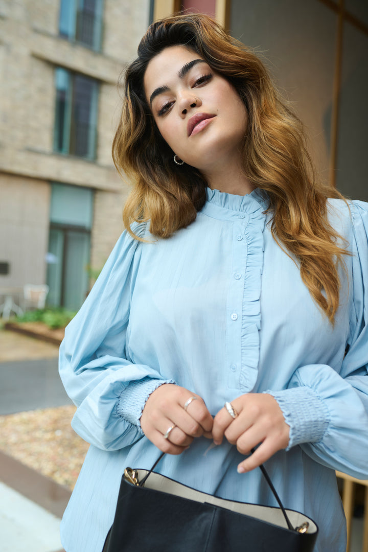 blouse in celestial blue