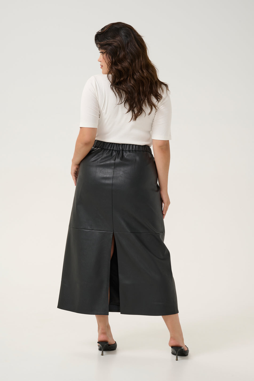 zwarte midi-rok in faux leather met split