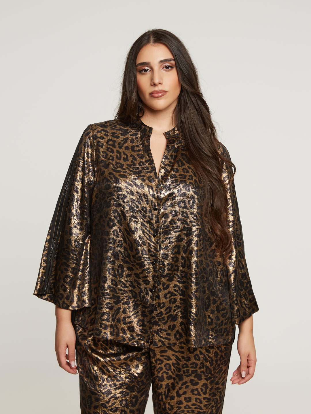 Statement blouse with leopard print and metallic sheen