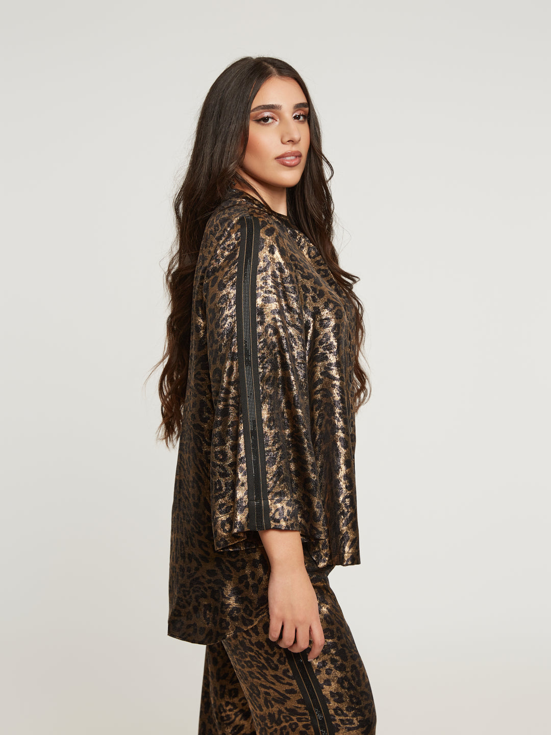 Statement blouse with leopard print and metallic sheen