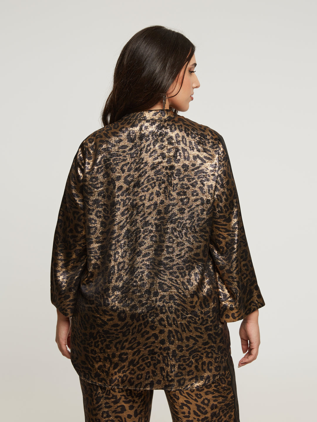 Statement blouse with leopard print and metallic sheen