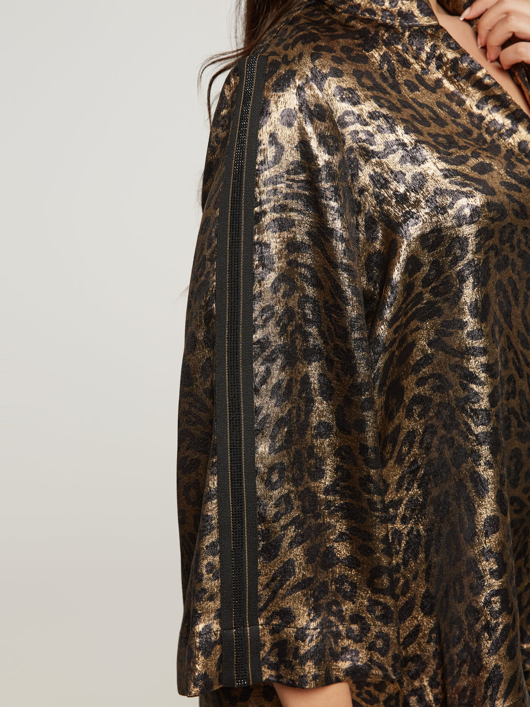 Statement blouse with leopard print and metallic sheen