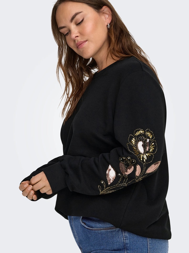 Sweater met pailletten en parels