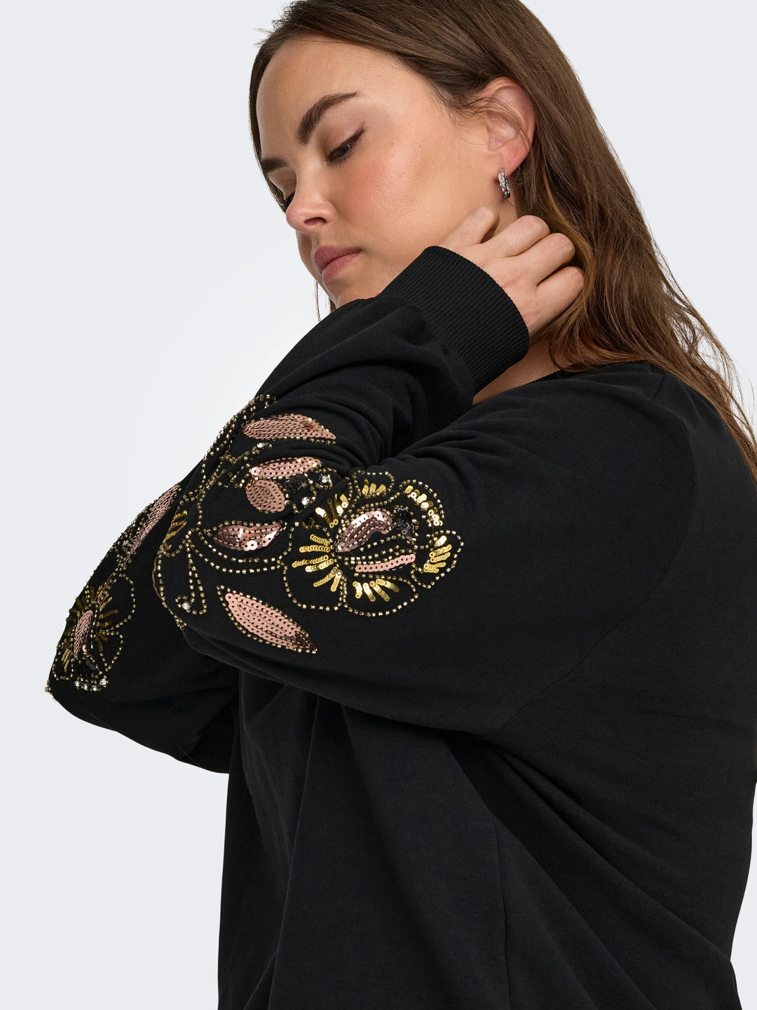 Sweater met pailletten en parels